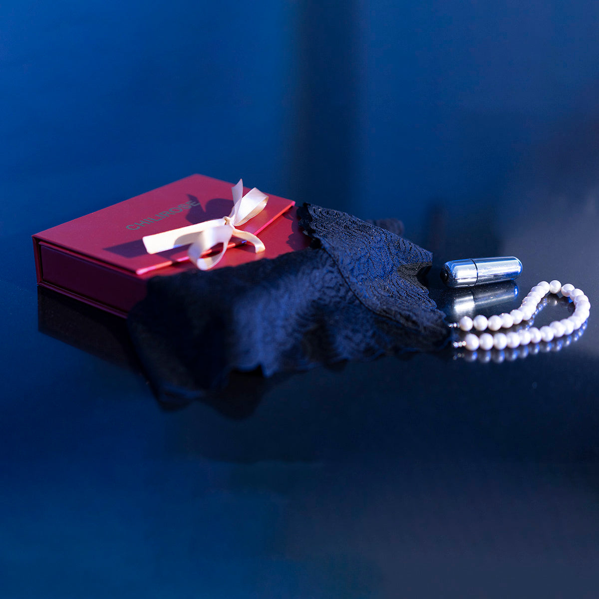 CR-4395 PEARL THONG BLACK WITH VIBRATING BULLET
